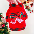 Red polyester Christmas jumper for a small dog on a white background.