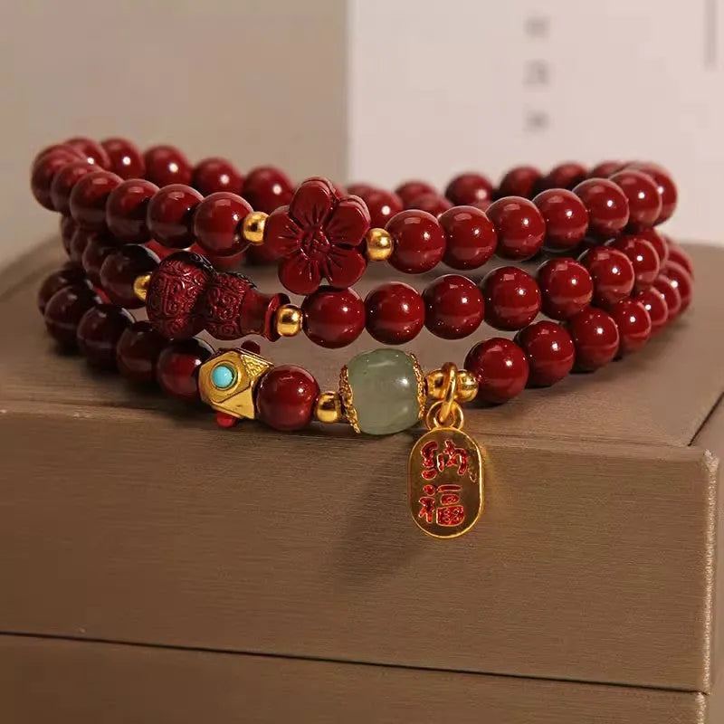6mm cinnabar bracelet with multi-circle gourd and five petal flower Chinese design in polished finish