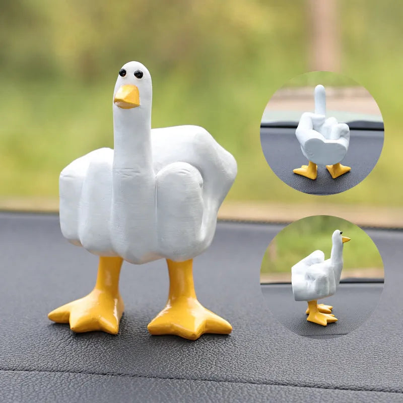 Creative vertical resin middle finger duck car ornament in pink on dashboard
