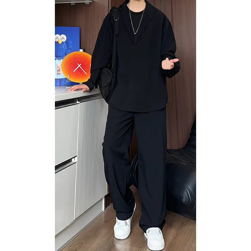 Men's black casual two-piece set with long sleeve polo shirt and trousers on a hanger