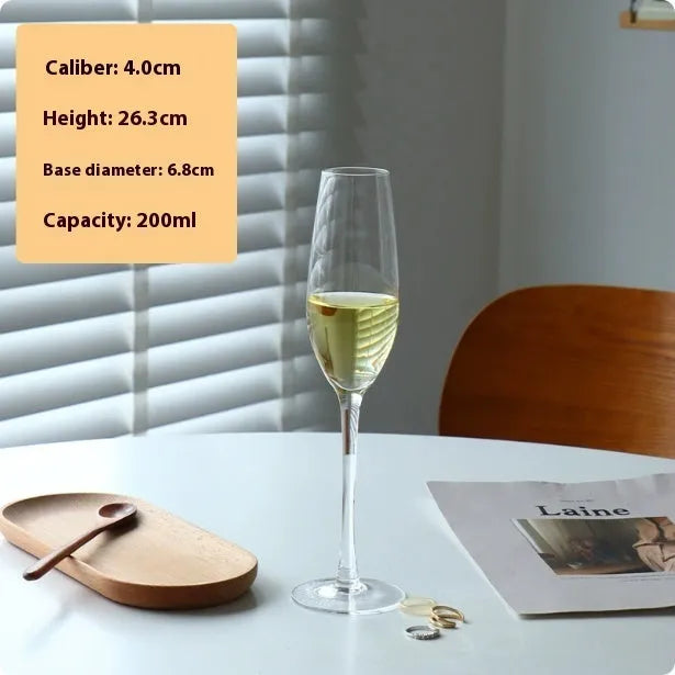 Set of six French-design champagne glasses in various crystal goblet styles including tulip and flute shapes