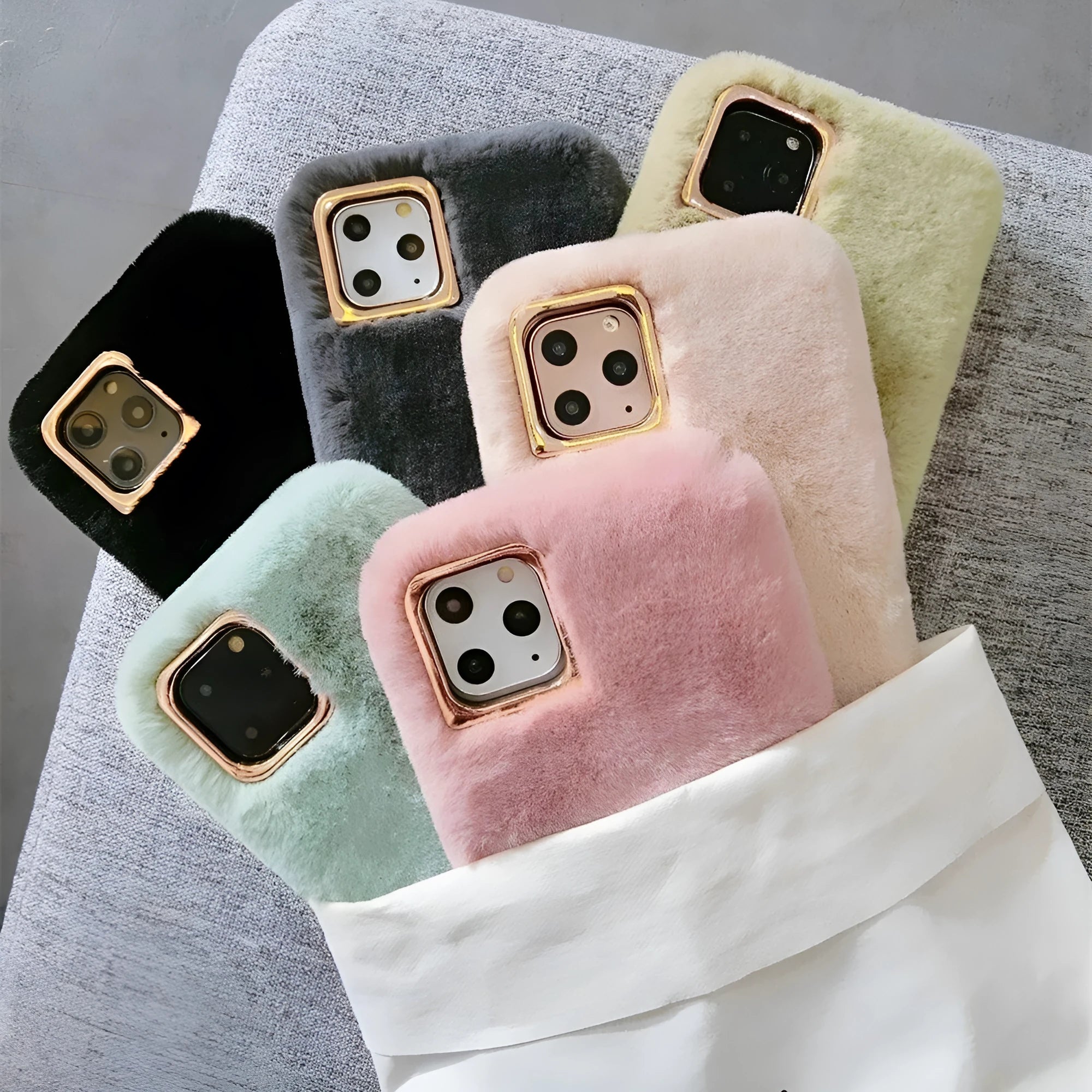 Rabbit plush phone case with thick padding and soft silicone shell for iPhone, shown in apricot colour.
