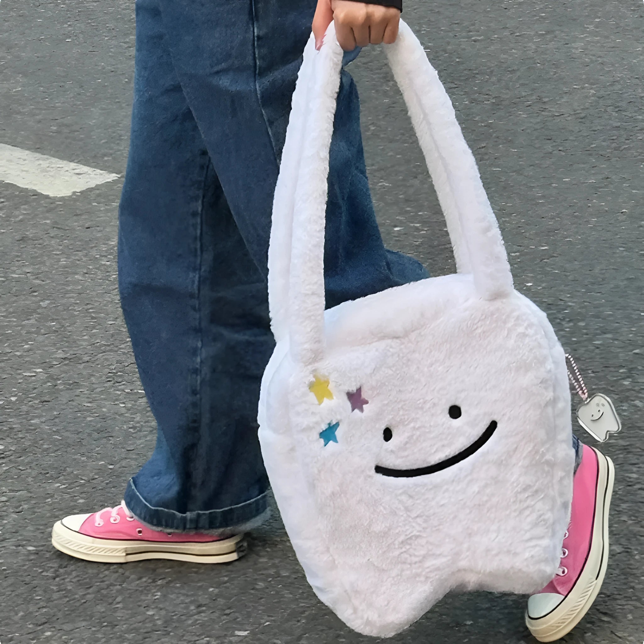White plush large tooth design shoulder tote bag with crossbody strap and zipper opening