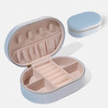 Oval velvet jewellery storage box in lake blue with internal hook for necklaces.
