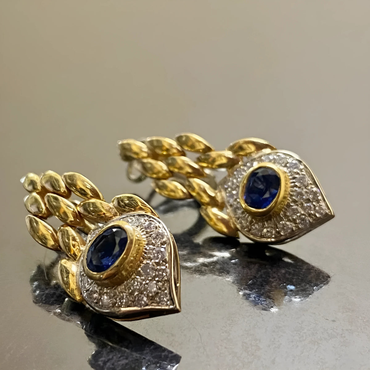 Pair of women's snake motif drop earrings in imitation gold with electroplated alloy finish