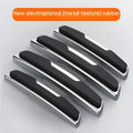 Four black plastic silicone car door bumper strips, each measuring 9.5 by 2 centimetres.
