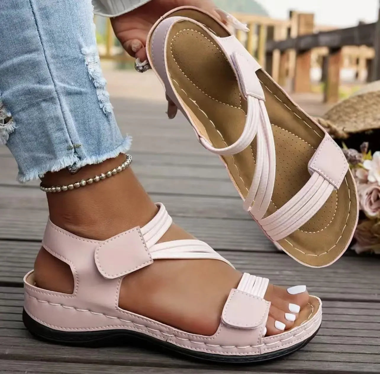 Women's lightweight sports sandals with Velcro fastening in black, showing PU upper and round toe design