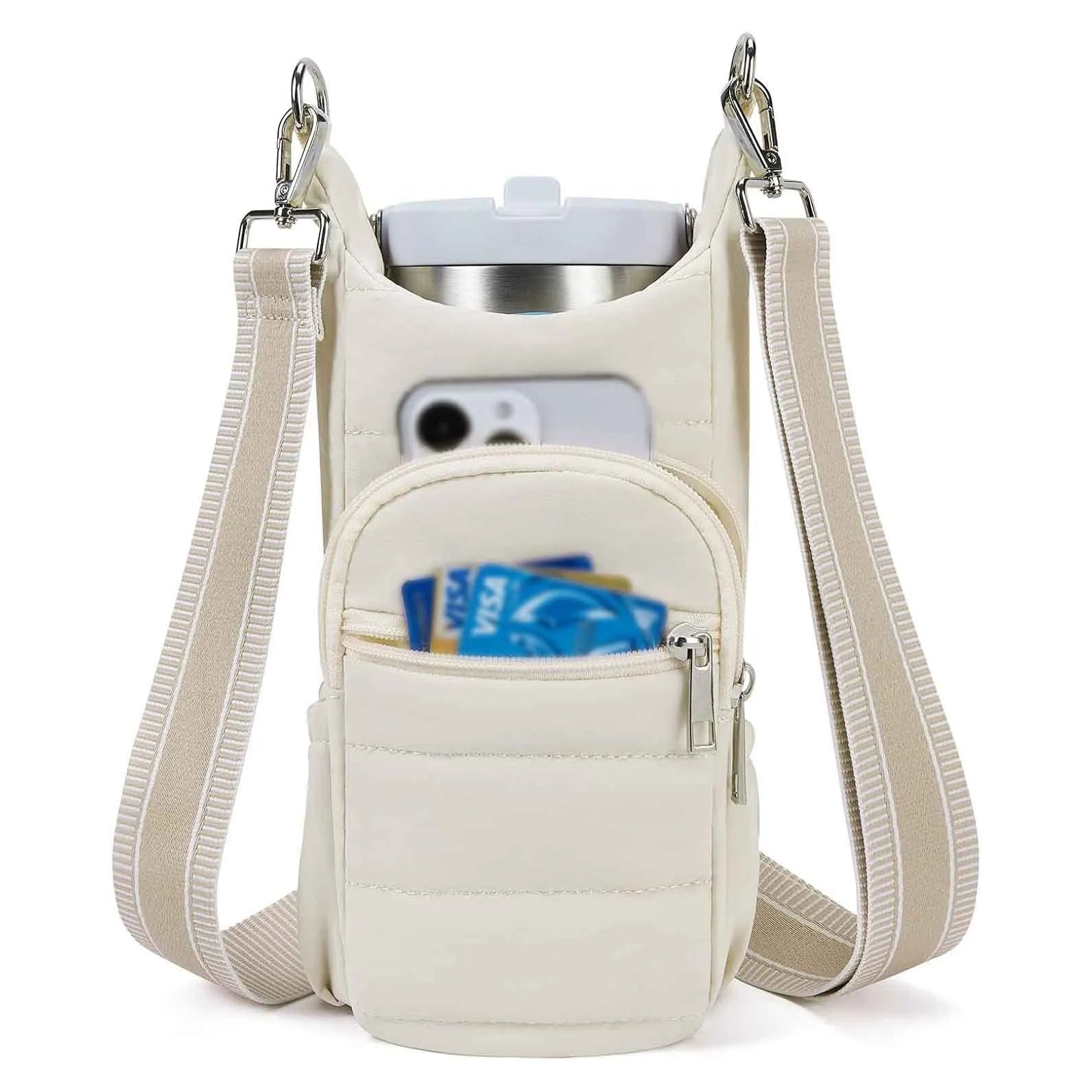 Cycling water bottle kettle bag mounted on bicycle frame in beige colour
