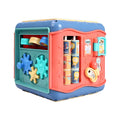 Colourful hexahedron educational toy showing bead maze, gear connections, and clock learning activities