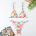 Women's floral printed halterneck bikini set in blue on a mannequin