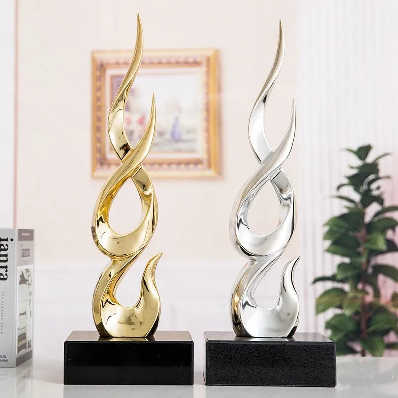 Resin festival high-rise decoration craft in bright gold colour with modern simplicity design