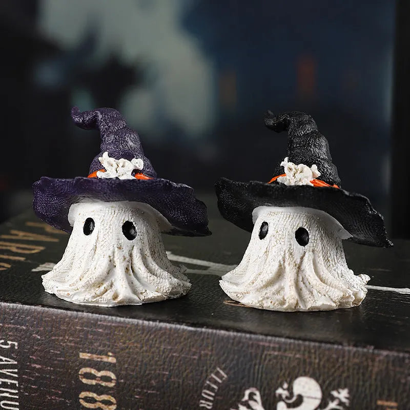 Black and purple resin wizard hat holiday ornament on a festive background.