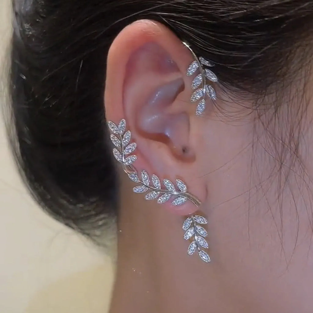 Gold detachable micro-inlaid zircon tree willow earrings pair on white background