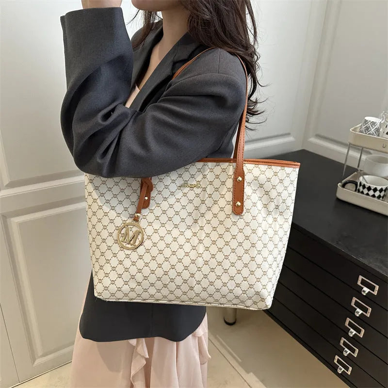 Black PU street-trend shoulder bag with sewing thread detail, shown with a 42cm wide top opening.