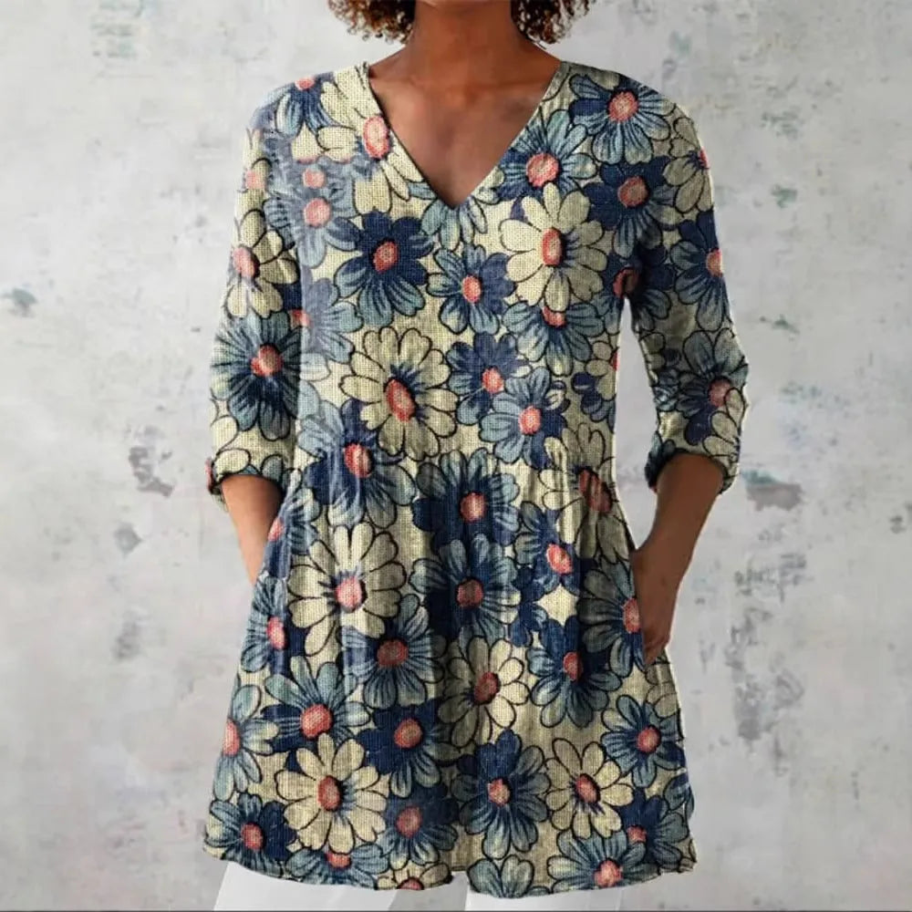 Women's retro-style slim fit long-sleeved top with a colourful digital print pattern.