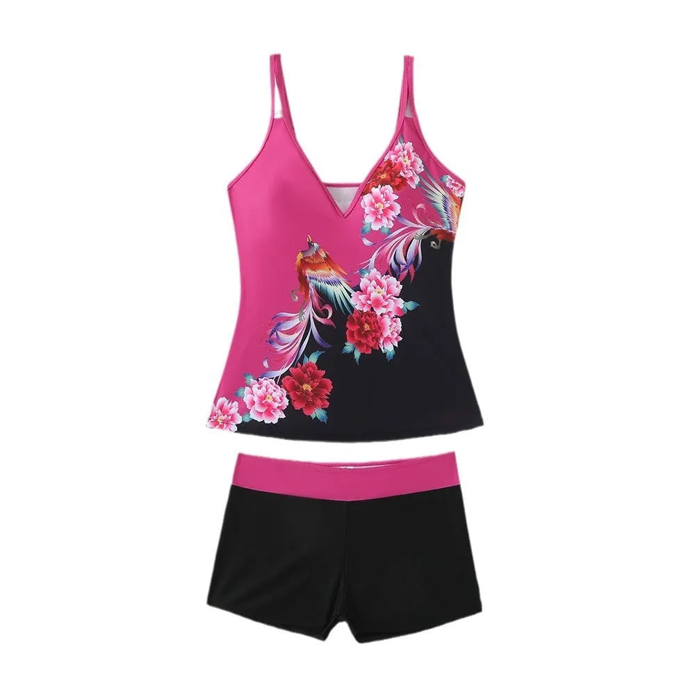 Women's plus size black and rose red two-piece swimsuit bikini set on a mannequin.