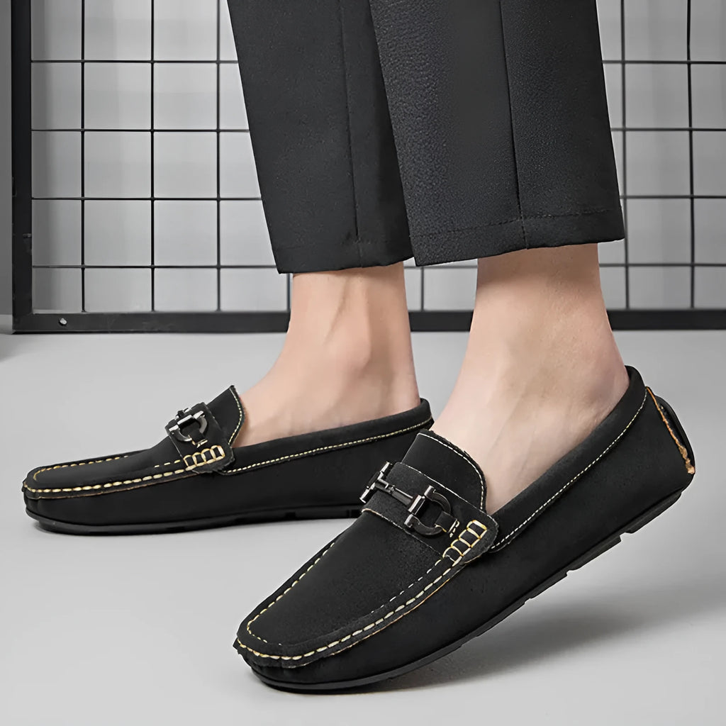 Men's beige cowhide leather slip-on loafers with round toe and rubber sole on a neutral background.