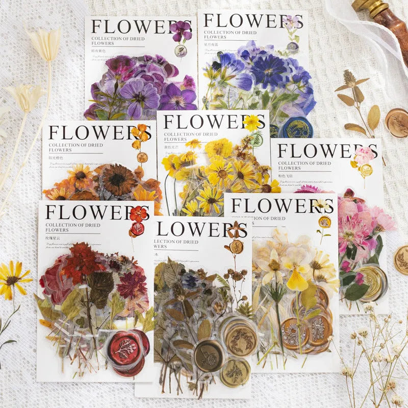 Set of 40 printed PET decorative stickers showing eight artistic styles including dried flowers and leaf specimens.