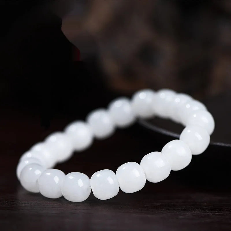 White Hetian jade barrel bead bracelet for men and women shown in three bead size options.