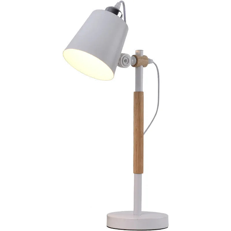 Bamboo Nordic desk lamp with touch switch and wireless charging pad in white finish on a bedside table