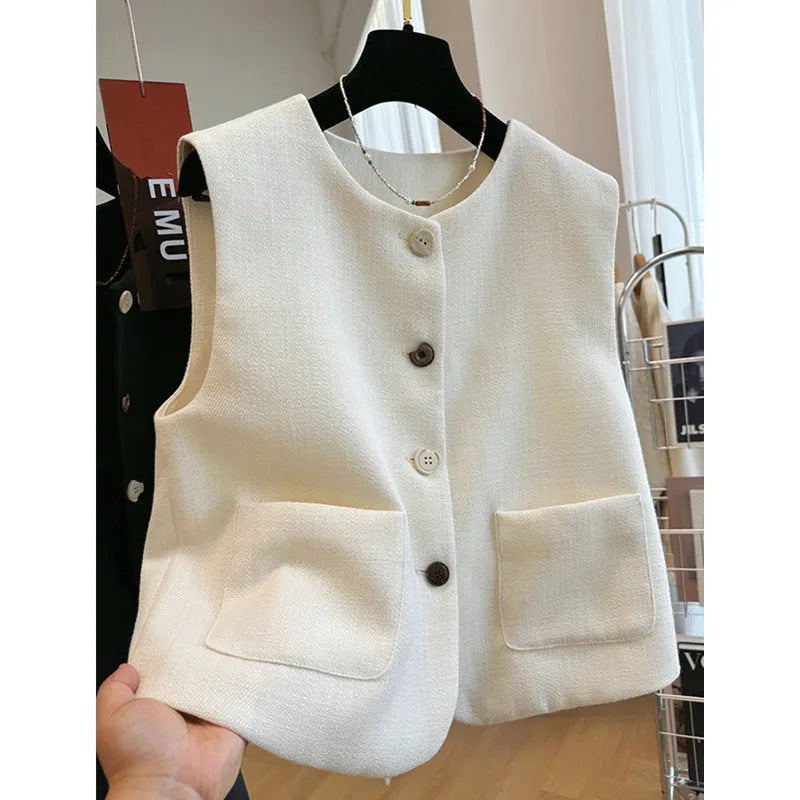 Women's French style round neck bandage vest in polyester fabric, available in milky white and black colours