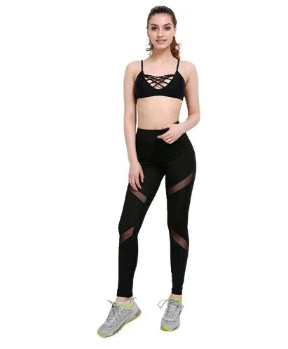 Women's yoga pants with butterfly mesh gauze panels in black, dry fit nylon spandex fabric