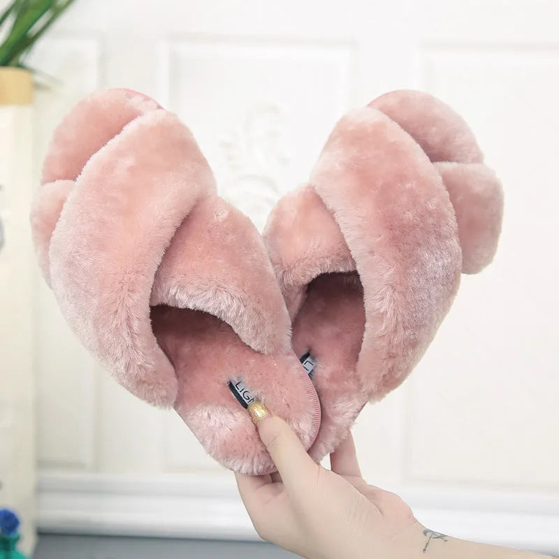 Cross open-toe fur slippers in black with a patterned non-slip rubber sole.