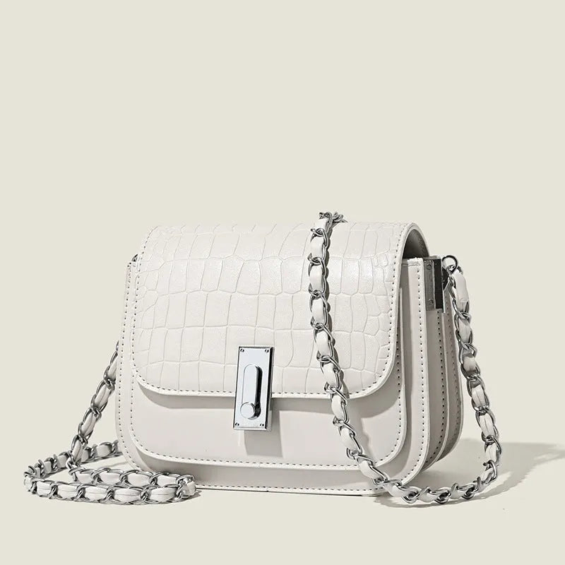 Soft black PU leather women's chain shoulder bag with adjustable strap and square shape.