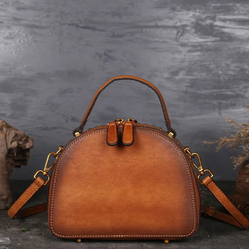 Vintage suede cowhide leather handbag showing interior organisation compartments