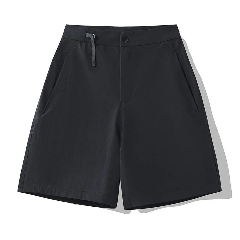 Men's khaki quick-dry sports shorts with 3D cut and four-way stretch fabric for athletic movement.