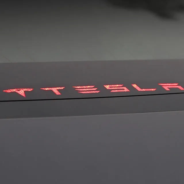 Acrylic brake light decoration sticker applied on a Tesla Model3 tail light