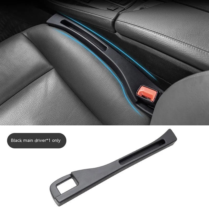 Black plastic car seat gap storage organiser box with handle between vehicle seats