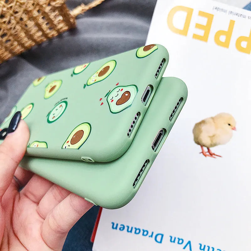 A flexible TPU phone case with a colourful painted cartoon avocado design on the back.