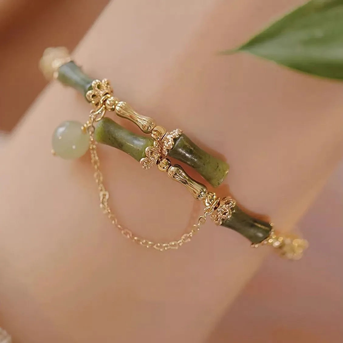 Women's bamboo beaded bracelet with coloured glaze beads and bamboo joints in plum wine colour