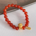 Chinese style red agate bracelet for women with dragon design, manual craftsmanship.