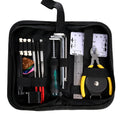 Black plastic case open to reveal 24 hardened steel guitar repair tools including cutters, winders, and files