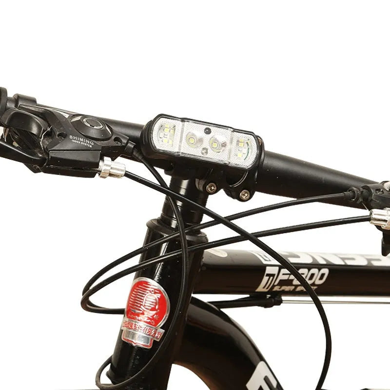 Black bicycle headlight with 350 lumen XPG-LED mounted on handlebars