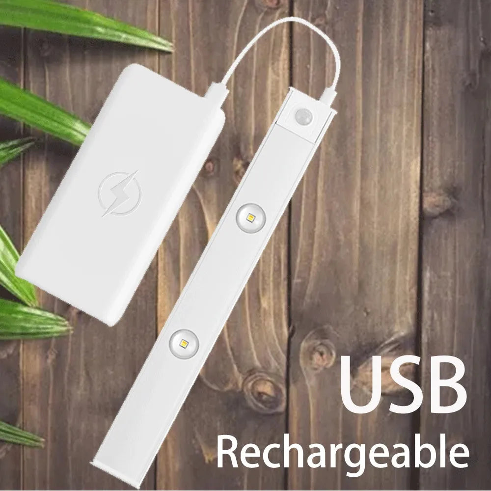 Silver ultra-thin USB rechargeable LED light strip with motion sensor for cabinet mounting.