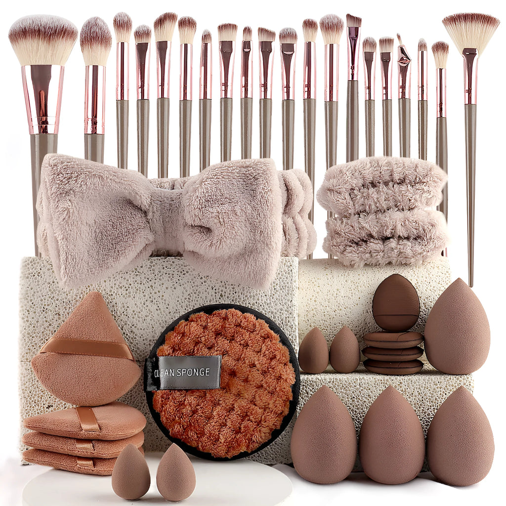 Beauty tool combination set with multiple pieces in brown, pink, and purple colours for face wash and makeup application