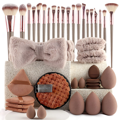 Beauty tool combination set with multiple pieces in brown, pink, and purple colours for face wash and makeup application