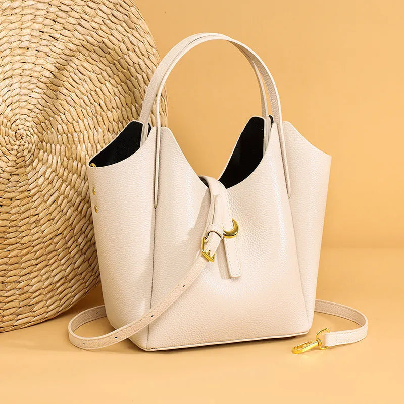 Genuine leather women's retro bucket bag with hand holding design in black, beige, khaki or lake blue colour