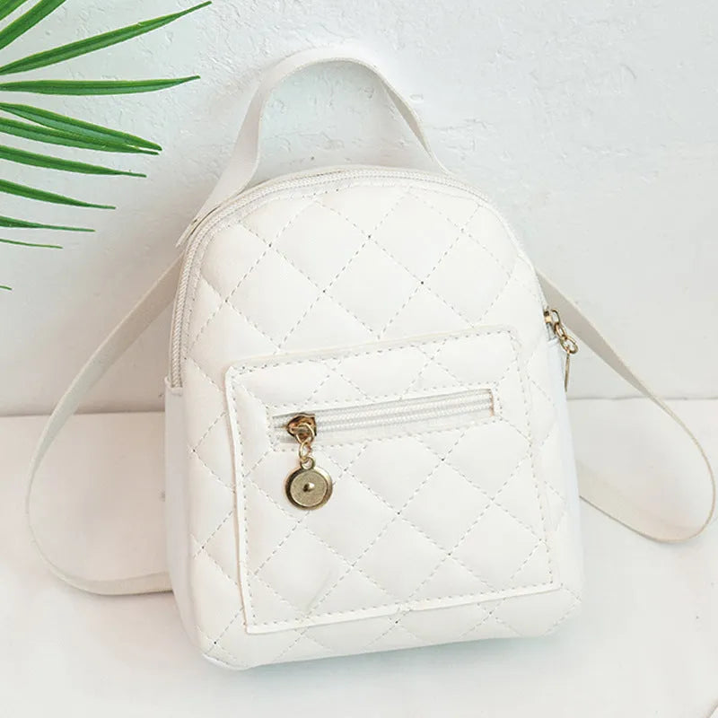 Hard shell white Korean style embroidered girls backpack with soft handle on a square background.