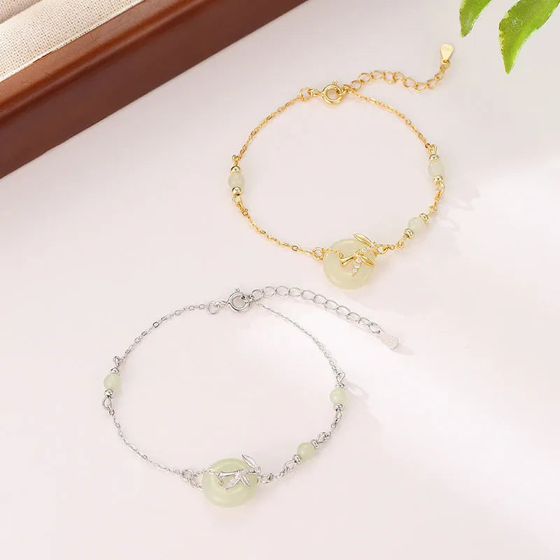 Women's antique style 925 silver bracelet with safety buckle closure and peace buckle decorative element
