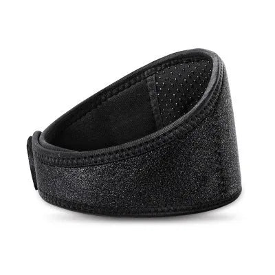 Black self-heating magnetic therapy neck guard with adjustable shoulder strap shown flat.