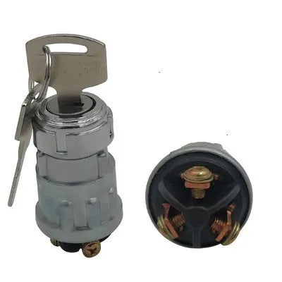 Copper vehicle ignition switch with a key for trucks and forklifts.