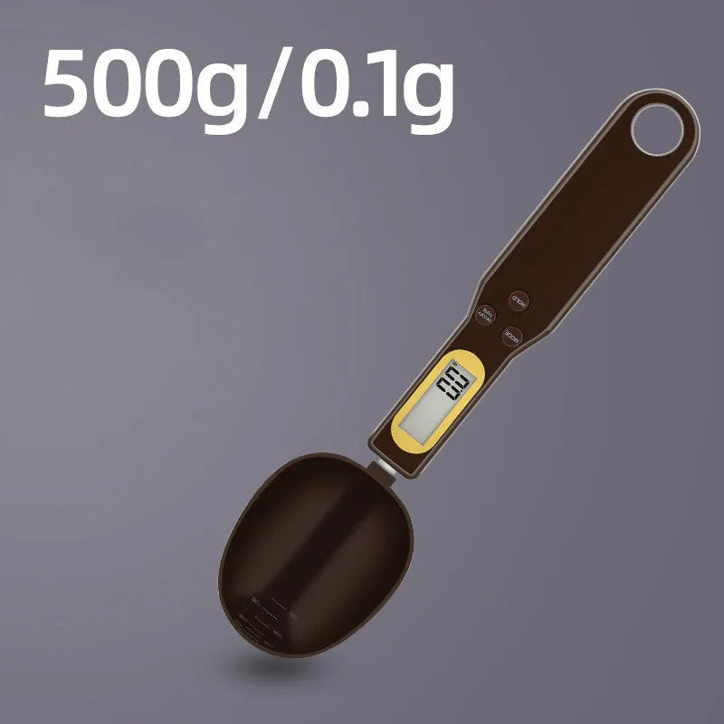 Black electronic digital scale with integrated measuring spoon showing weight display.