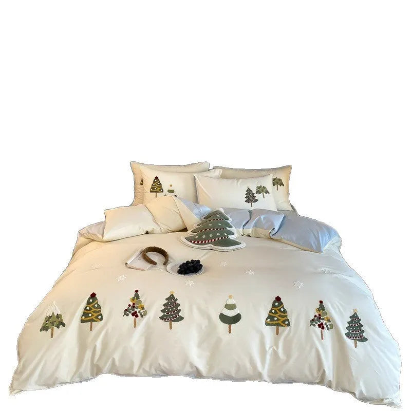 Cream Blue pure cotton duvet cover with raised white Christmas tree embroidery, paired with a fitted sheet and pillowcases.