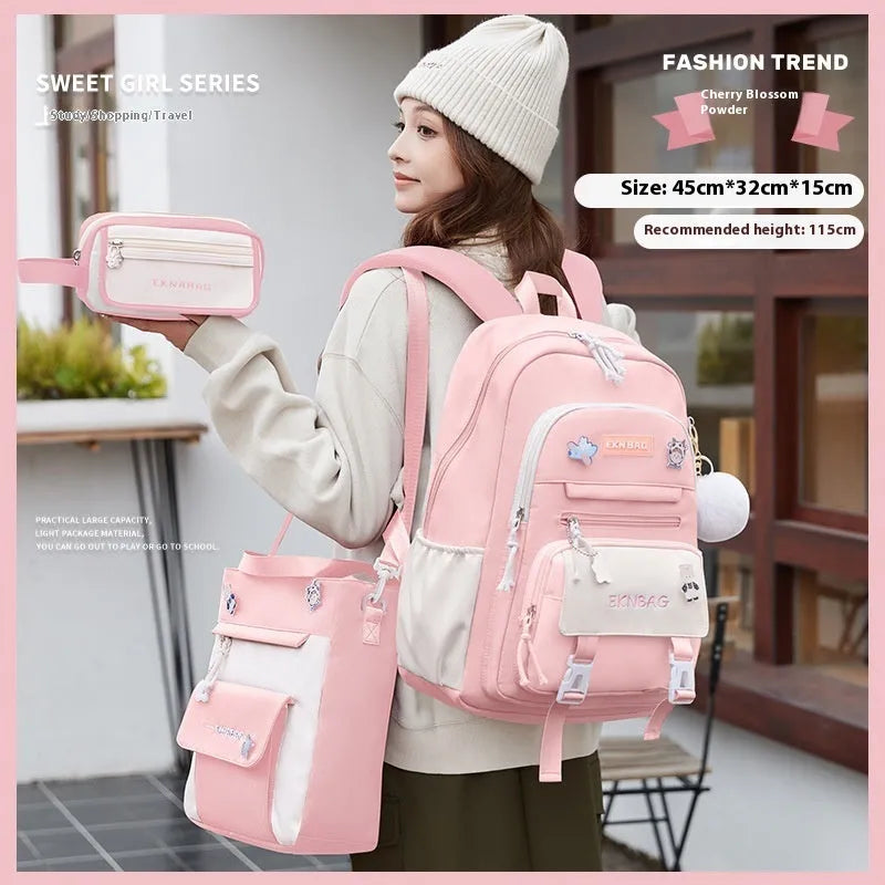 Pink waterproof Oxford cloth school backpack for girls with curved shoulder straps.