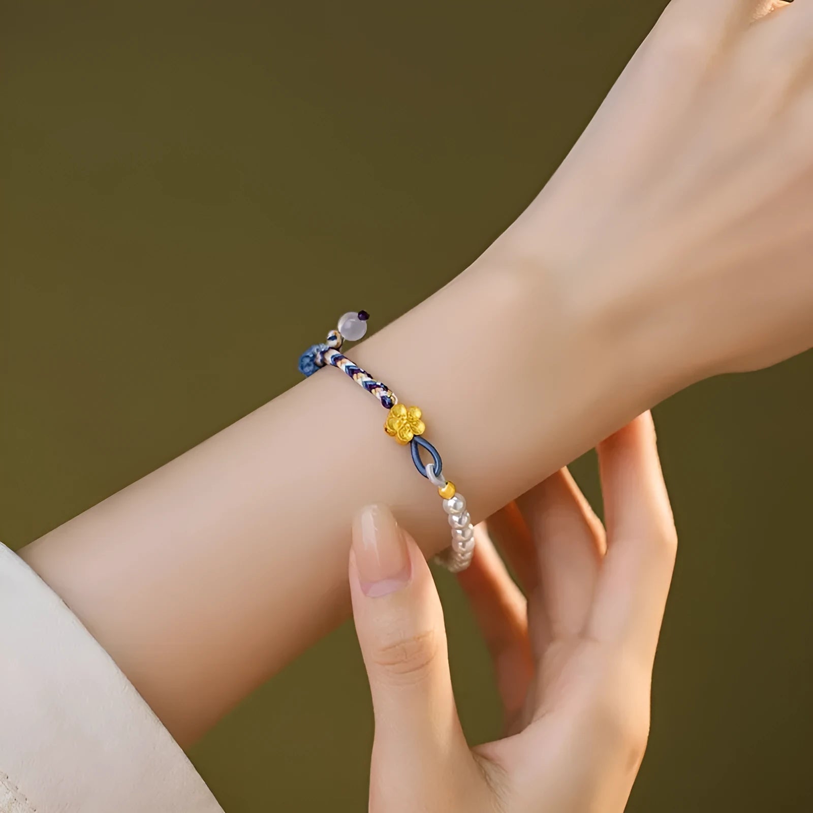 Peach-coloured sterling silver bracelet with Chinese flower weaving and pearl decoration