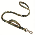 Retractable dog lead for large breeds extended to 5 metres, showing the handle, casing, and reflective stitching.